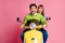 Photo of funny excited lady guy couple driving sitting speed good mood vintage yellow moped cool vacation wear casual