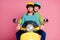 Photo of funny excited lady guy couple driving sitting speed good mood vintage yellow moped vacation wear casual sweater
