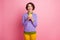 Photo of funny lady hold telephone chatting friends wear purple jumper pants isolated pink color background