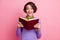 Photo of funny lady open mouth read historic novel wear purple jumper isolated pink color background