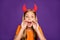 Photo of funny little lady headband horns on head sharing rumours wit classmates chatterbox october party wear orange t-