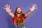 Photo of funny positive person with beard long hairstyle dressed print shirt stretching palms to you isolated on violet