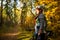 Photo of girl in helmet on bicycle in autumn forest