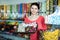 Photo of girl in the shop with lots of sweets