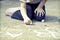 Photo of girl writing with chalk on the schoolyard