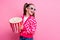 Photo of glamour cheerful lovely girl wear stylish outfit looking empty space poster cinema cartoon isolated on pink