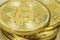 Photo Of Golden Bitcoin virtual currency coin.