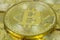 Photo Of Golden Bitcoin virtual currency coin.