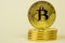 Photo Of Golden Bitcoin virtual currency coin.