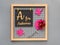 Photo grid board with purple paper Autumn leaves, a flower and paper text A for Autumn