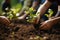 Photo Group of people planting seedlings in a close up scene