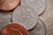 Photo of grouped dollar coins on the table.