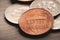 Photo of grouped dollar coins on the table.