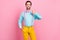 Photo of handsome adorable young guy dressed teal clothes showing thumb up smiling isolated pink color background