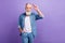 Photo of handsome aged man happy positive smile show fingers hello salute sign isolated over violet color background