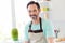 Photo of handsome bearded mature man shiny smile beaming smile wear apron blue t-shirt home kitchen indoors