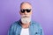 Photo of handsome elderly man serious confident wear denim shirt beard isolated over purple color background