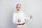 Photo of handsome hooray grey hair old man hands fists wear spectacles shirt  on grey color background