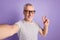 Photo of handsome retired man take selfie show peace cool v-symbol isolated over violet color background