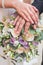 Photo of happy just married wedding couple holding a bouquet