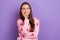 Photo of happy lady young age wear pink strawberry print cardigan touch cheek look empty space dream her future isolated