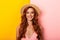 Photo of happy nice woman wearing straw hat looking at camera and smiling