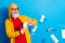 Photo of happy positive good mood grandfather look copyspace throwing money isolated on blue color background