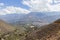 Photo of the hills, the road to Pavas at noon, diverse vegetation, a shining sun and in the background the city of Caraz