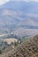 Photo of the hills, the road to Pavas at noon, diverse vegetation, a shining sun and in the background the city of Caraz