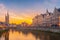 The photo historic city of downtown Ghent cityscape of Belgium with the beautiful sunrise.
