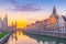 The photo historic city of downtown Ghent cityscape of Belgium with the beautiful sunrise.