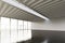 Photo of huge empty expo hangar in modern building.Interior loft style with concrete floor,panoramic windows.Abstract