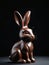 Photo Of A Hyperrealistic Image Of A Bunnyshaped Chocolate Sculpture Against A Dark Background. Generative AI