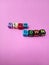 Photo Illustration, Word Slow Down from plastic alphabet cube beads