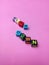 Photo Illustration, Word Slow Down from plastic alphabet cube beads