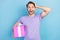 Photo of impressed cheerful person arm on head hold giftbox cant believe isolated on blue color background