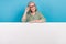 Photo of intelligent retired business woman touch eyewear grey hair striped shirt hand on huge banner promo code