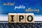 Photo on ipo initial public offering theme. wooden cubes with the abbreviation `ipo`