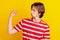 Photo of irritated annoyed young man wear striped t-shirt showing blah-blah-blah gesture isolated yellow color