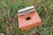 Photo Kalimba, acoustic music instrument from africa and its soft cover at Grass
