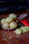 The photo is of kitchen spices in the form of potatoes, turmeric, white pepper against the background of an old radio