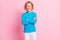 Photo of little boy folded hands toothy smile look camera wear blue turtleneck  pastel pink color background