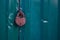 Photo of locked metal doors and rust keylock