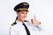 Photo of lovely lady raise thumb up beaming smile wear hat aviator uniform isolated white color background