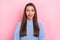 Photo of lovely young brown hairdo lady lick teeth wear blue pullover  on pink color background