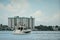 Photo of a luxury yacht in Miami with buildings in the background