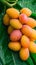 Photo Marian plum allure resembling plum, tastes like mango on banana leaf