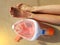 Photo of mask for diving, women`s legs on mat summer