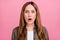 Photo of mature woman good mood shock gossip news omg wow reaction isolated over pink color background