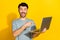 Photo of millennial excited positive guy bearded bristle brunet finger pointing empty space advertisement offer laptop